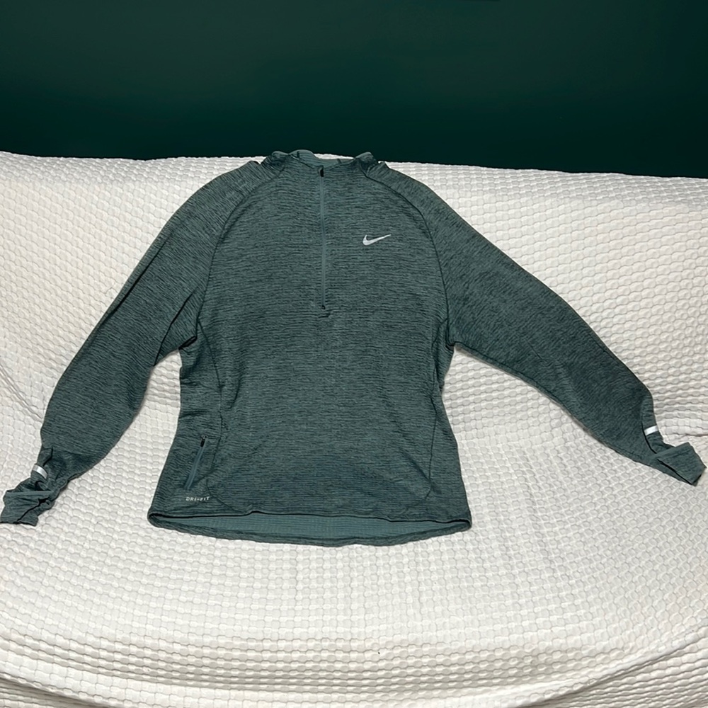 XL Nike Dry fit pull over. Lightweight, stretchy material. Half zip.